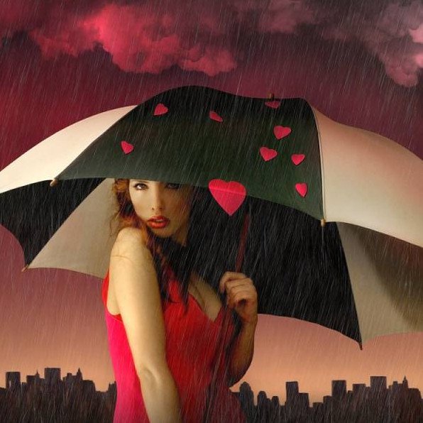 Красивая девушка в красивое платье с зонтиком