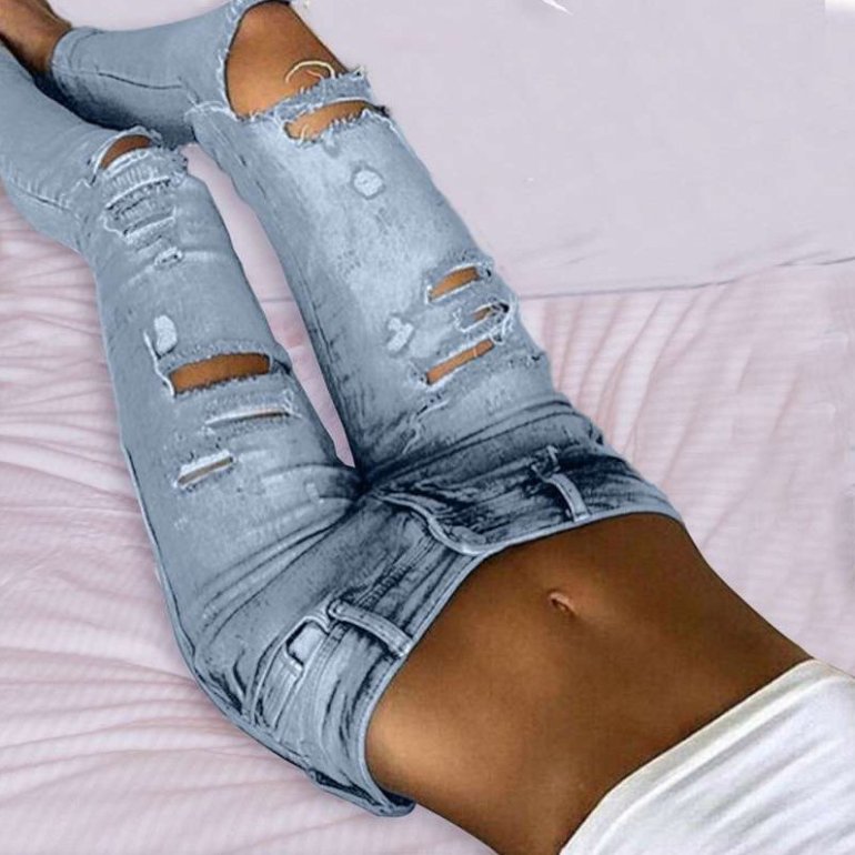 Мода: Рваные узкие джинсы